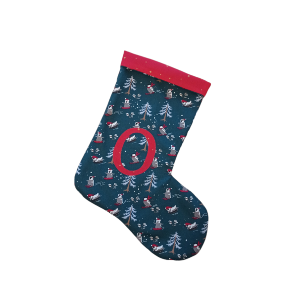 Χριστουγεννιάτικη κάλτσα πιγκουίνοι που κάνουν σκι